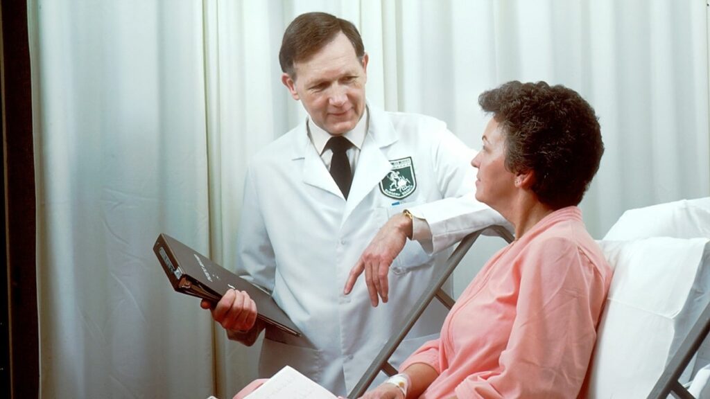 Doctor consulting with patient.